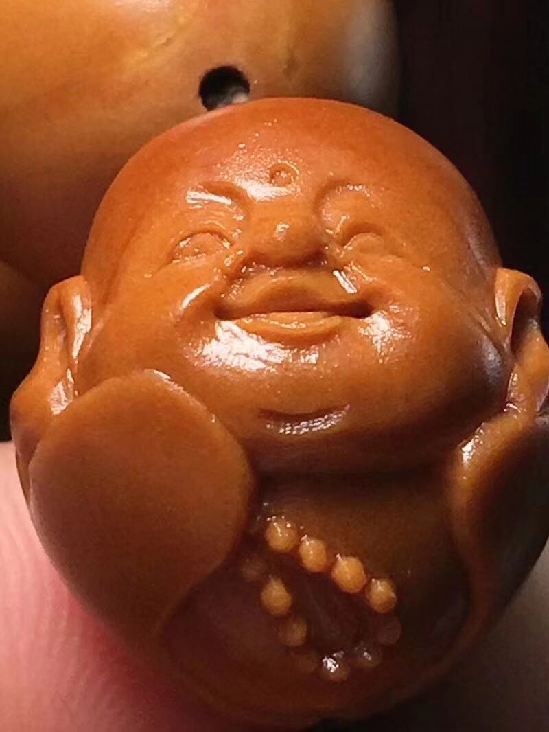 如何挑选核雕精品