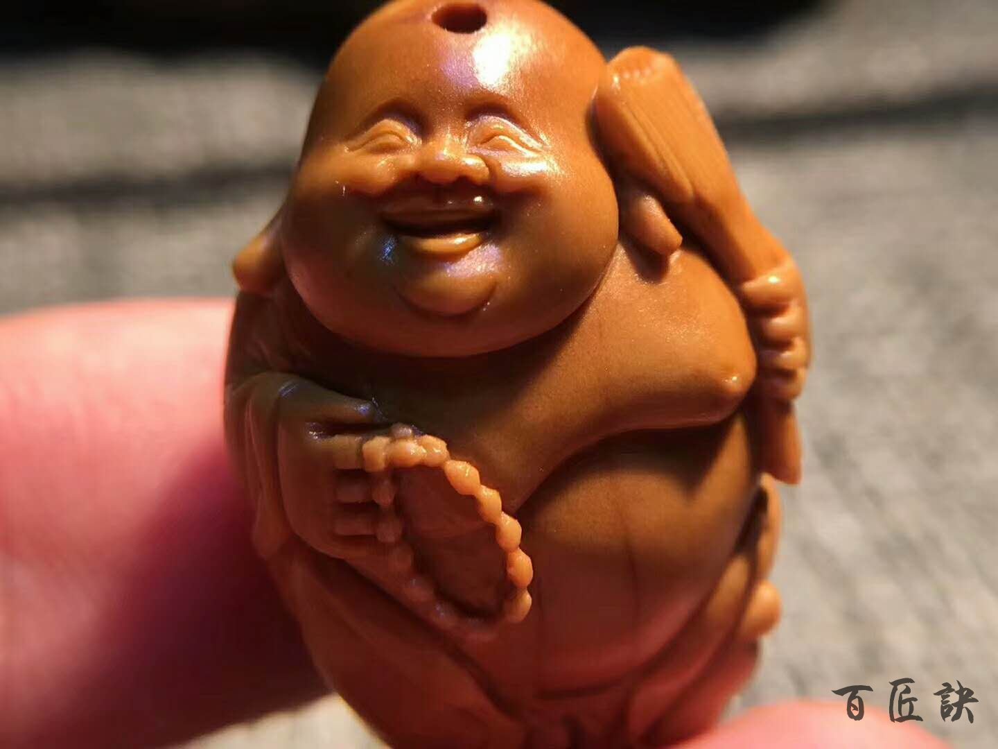弥勒佛橄榄核男的能带吗？